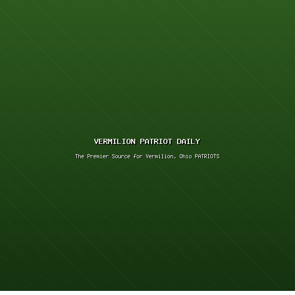 construction worker in safety vest examining blueprints on truck tailgate